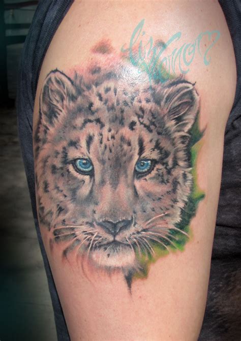 snow leopard tattoos